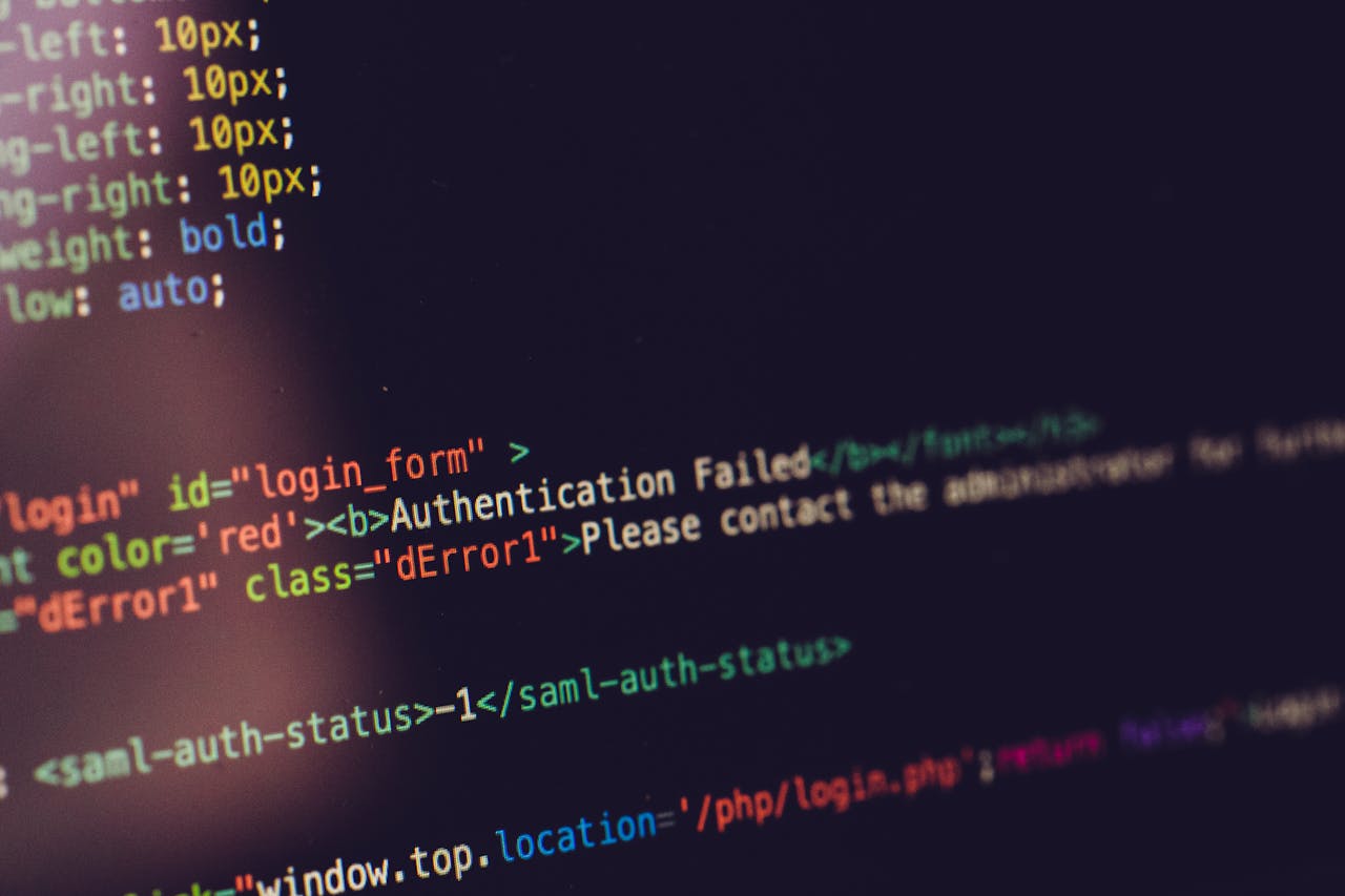 gallery-1 Close view of computer screen displaying HTML code with an authentication error.